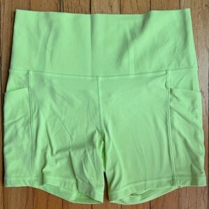 Vibrant Green Athleta 5" Salutation Stash Shorts (Size M) – Washed, Never Worn